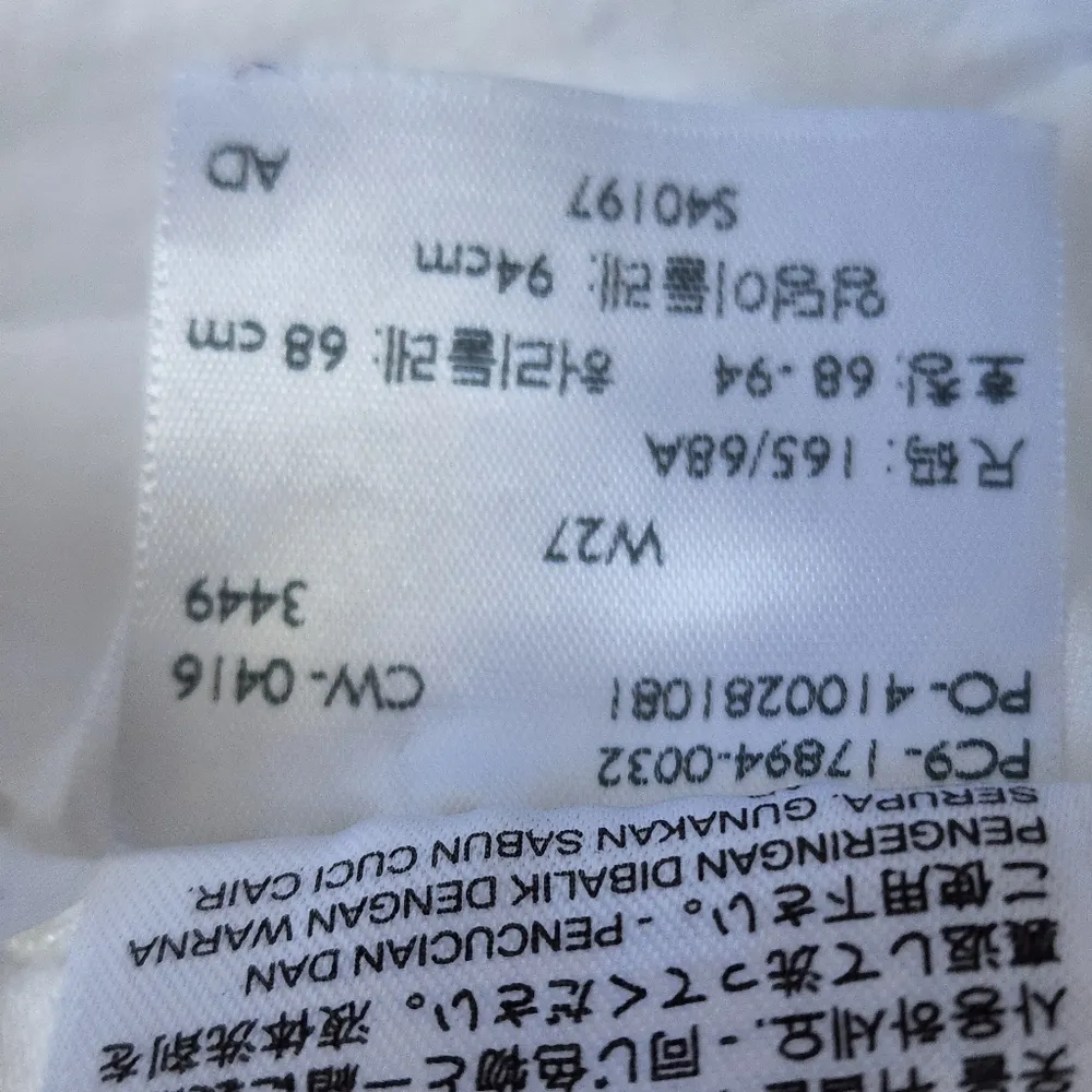 Levis chalk white mid length denim shorts size 27 - Image 6