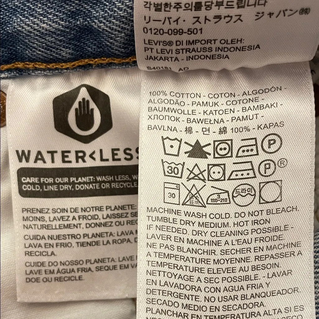 Levi’s Premium Women’s 501 Distressed Raw Hem Light Wash Button-Fly Denim Shorts - Image 9