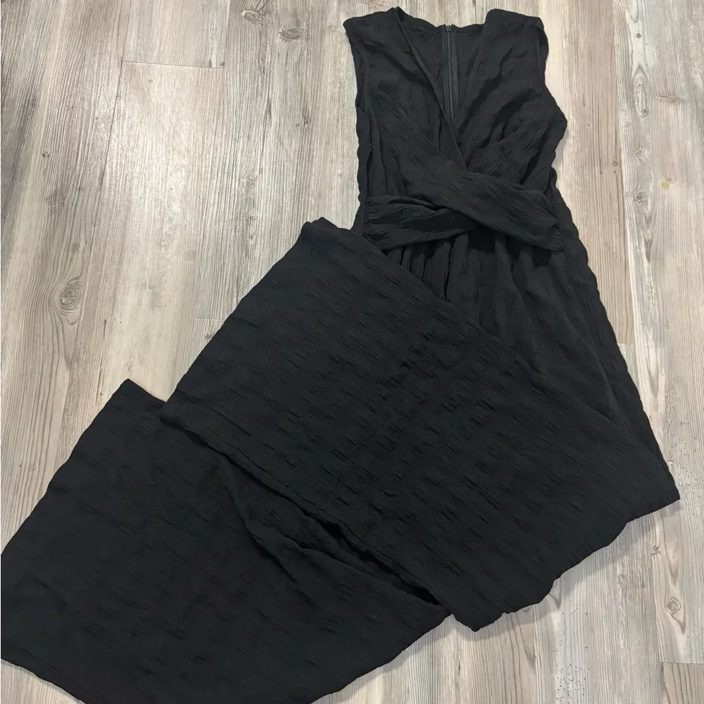 Black lightweight jumpsuit size small chest is 15 inseam is 27 - Image 4