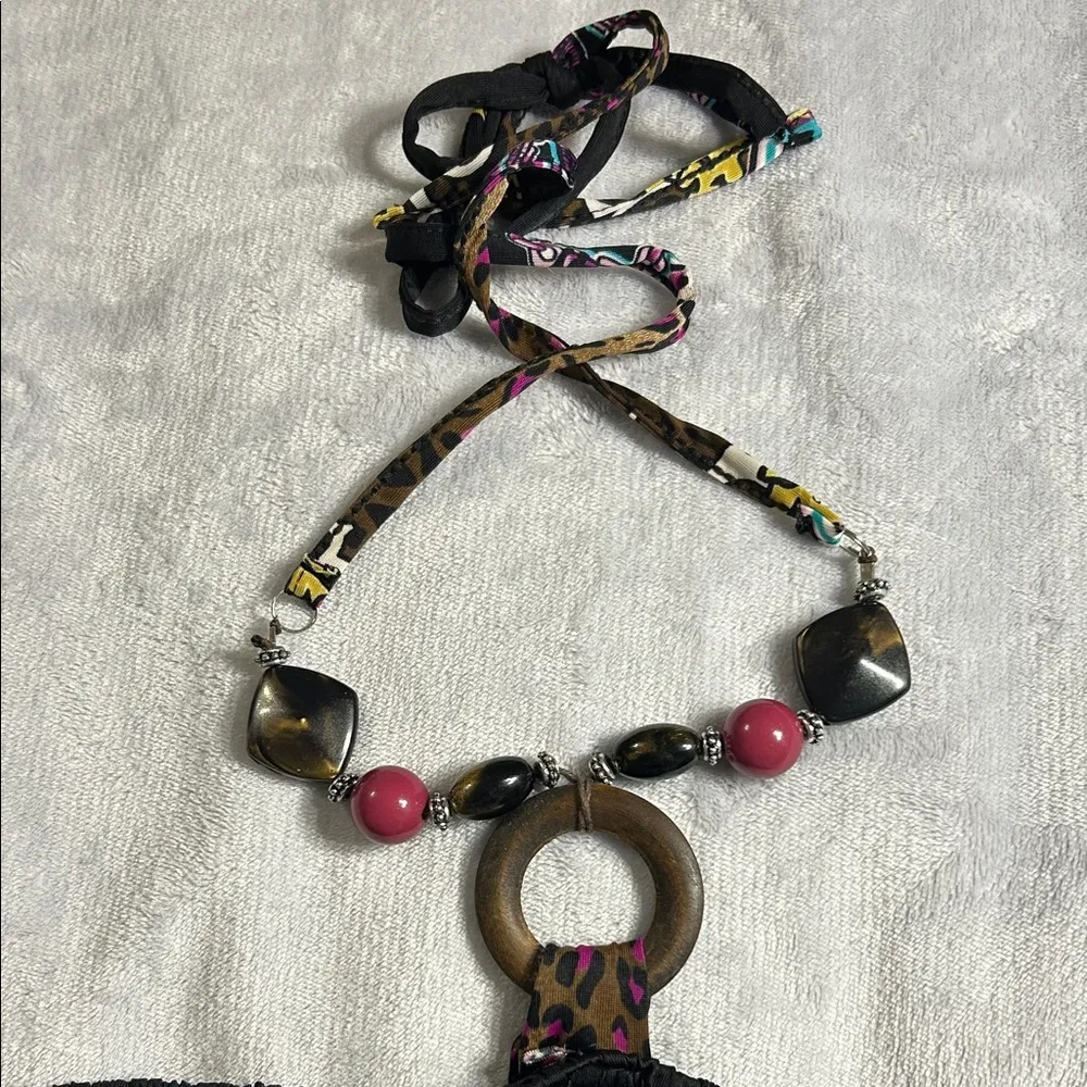 Magic  Black and Pink Halter Dress with Vibrant Pattern - Image 10