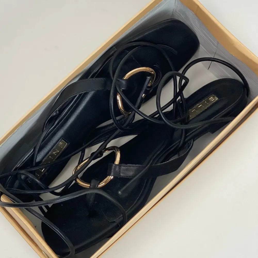 Billini Aisha Lace Up Sandal in Black with Gold O - Image 11