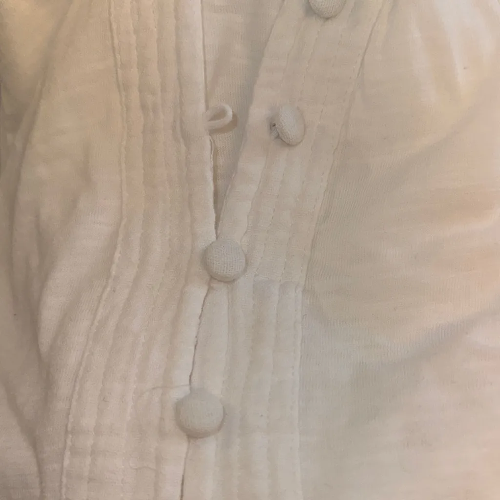 DESIGN HISTORY
SS Mixed Media Split‎ Neck Knit Top - Image 5