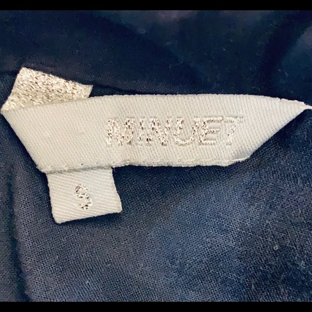 Navy blue sleeveless ruffled collar mini dress. - Image 6