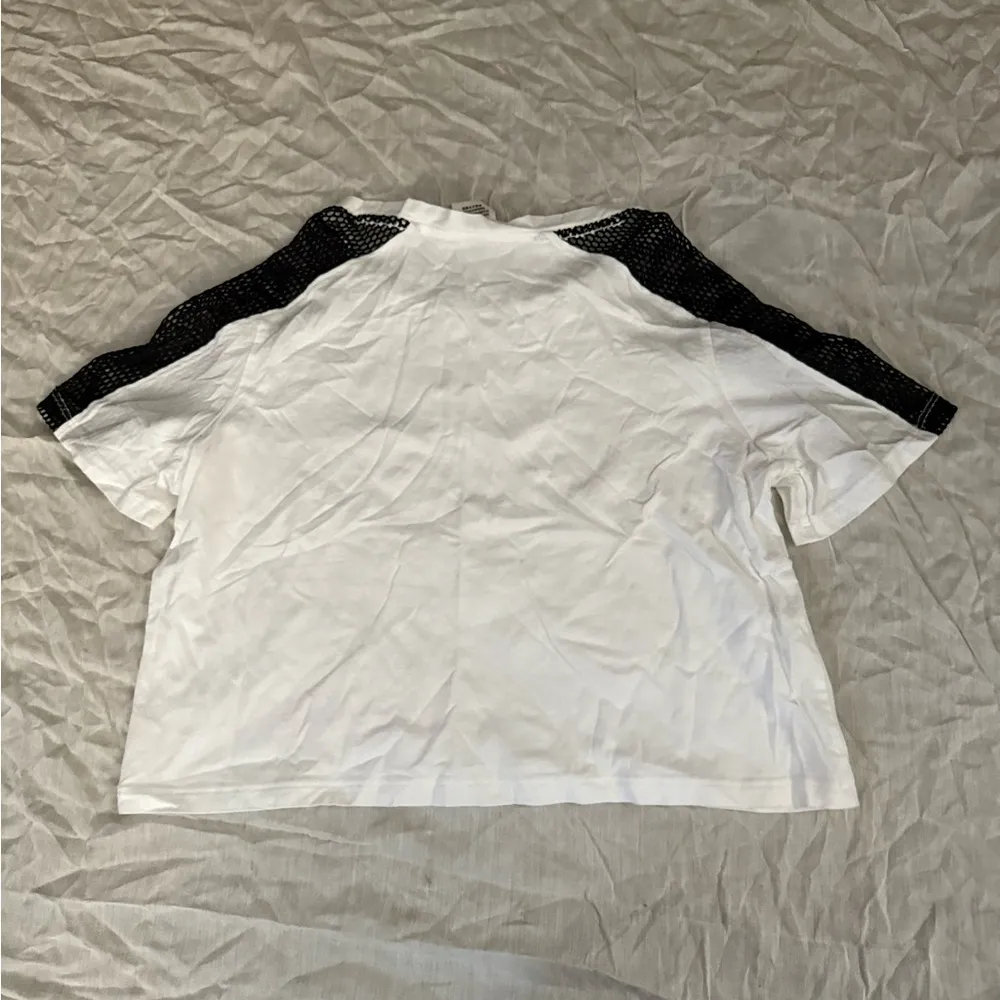 PINK Victoria's Secret White Crop Top with Black Mesh Sleeves - Image 2