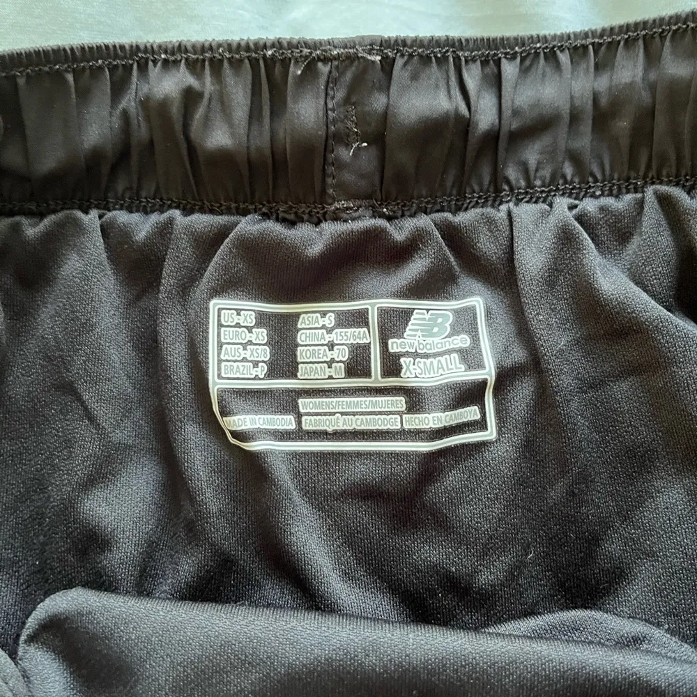 Never worn: New Balance black & white running shorts - Image 2