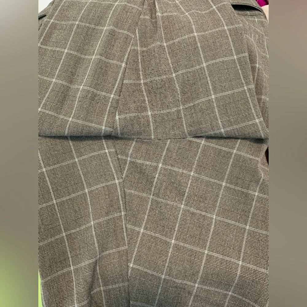 A.new day: a work attire staple. - Image 5