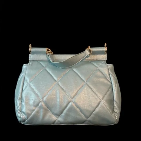 Light and ethereal quilted convertible crossbody rests like a dream on your arm - Image 4
