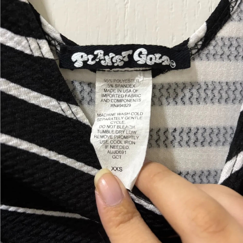 Planet Gold Black and White Fit and Flare Mini Dress - Image 2