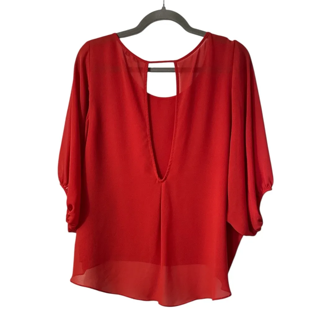 Naked Zebra 3/4 Sleeve Open Back Batwing Blouse - Image 4