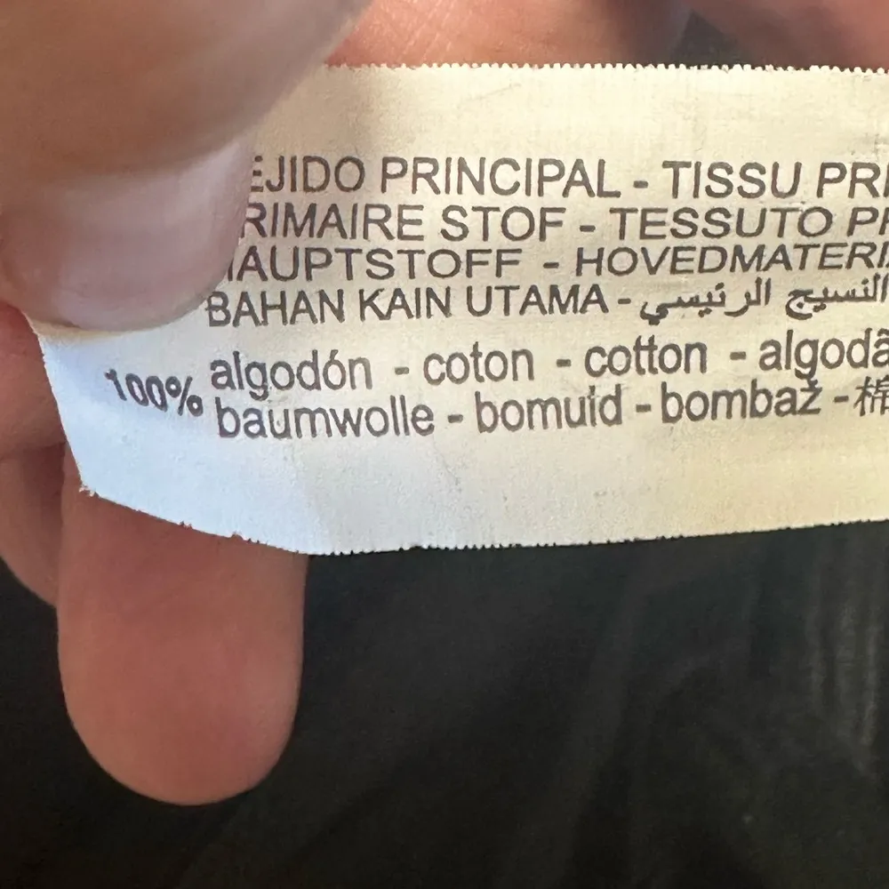 black oversized pullover sweatshirt dress with pockets and tie string hem - Image 5