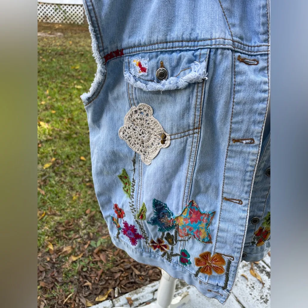 Chicos light wash distressed denim vest with boho patchwork appliqués. Size 1. - Image 3