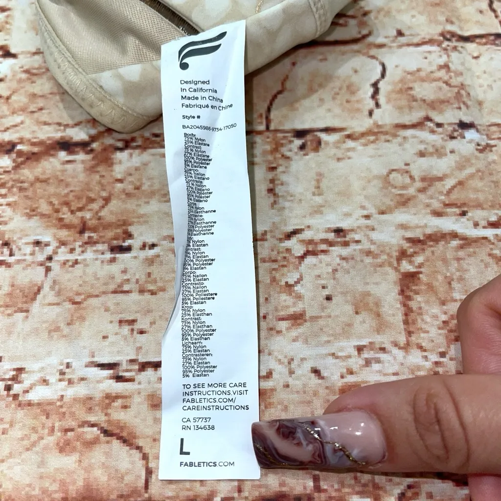 Fabletics Cream and Gold Patterned Sports Bra - Image 5