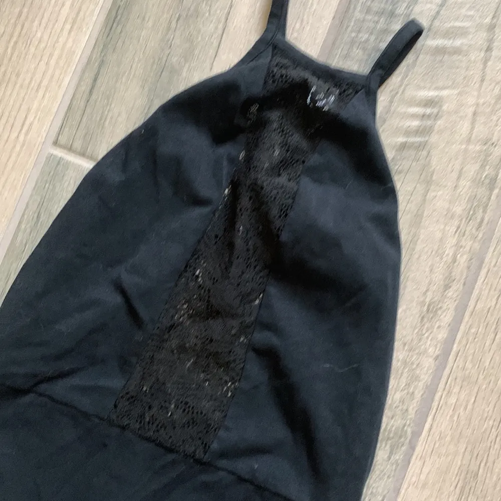 Out from under black bodysuit - Image 2