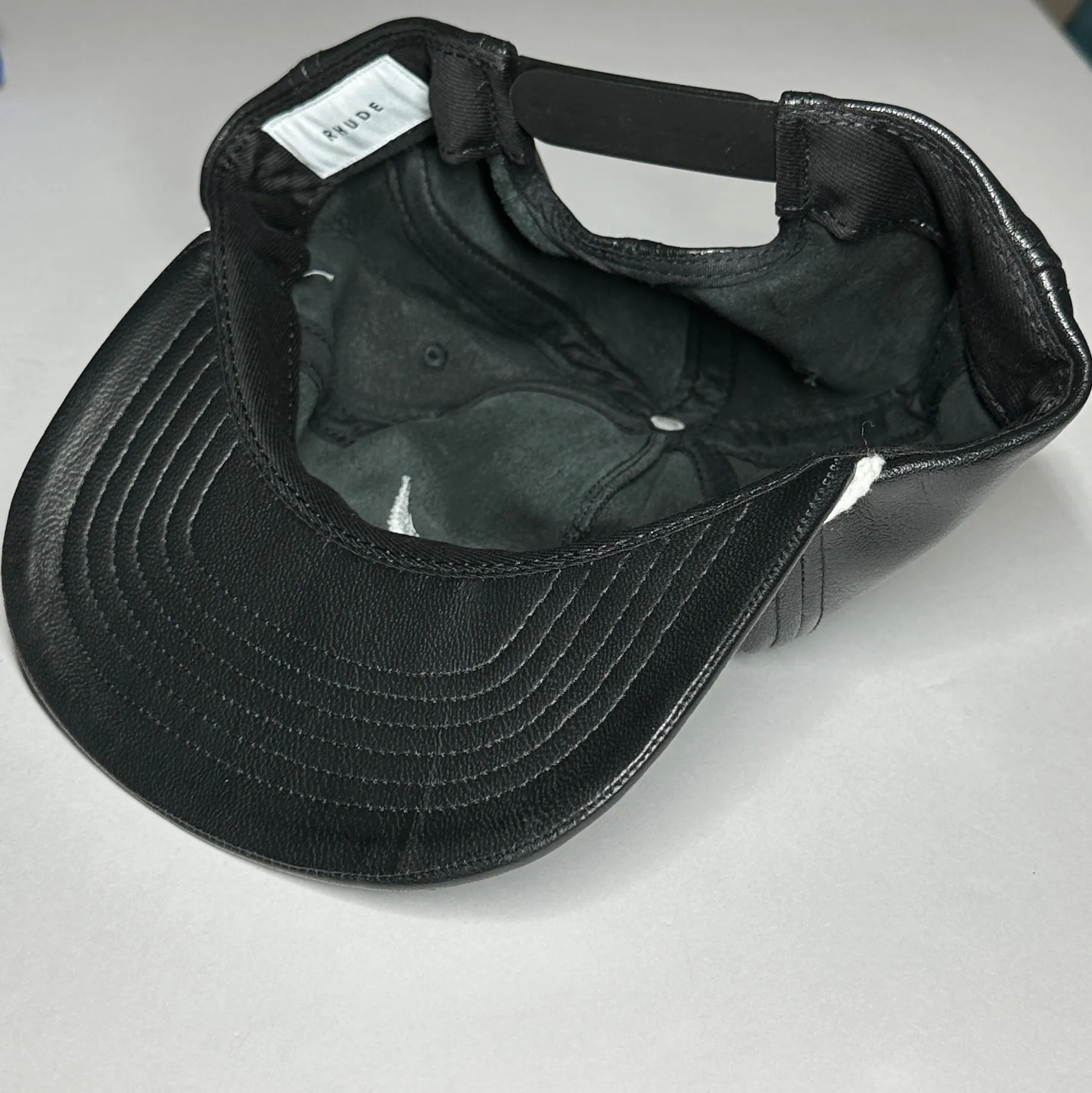 Rhude PS21 Classic Hat Black Leather baseball cap with multicolor embroidered racing logo on front - Image 4