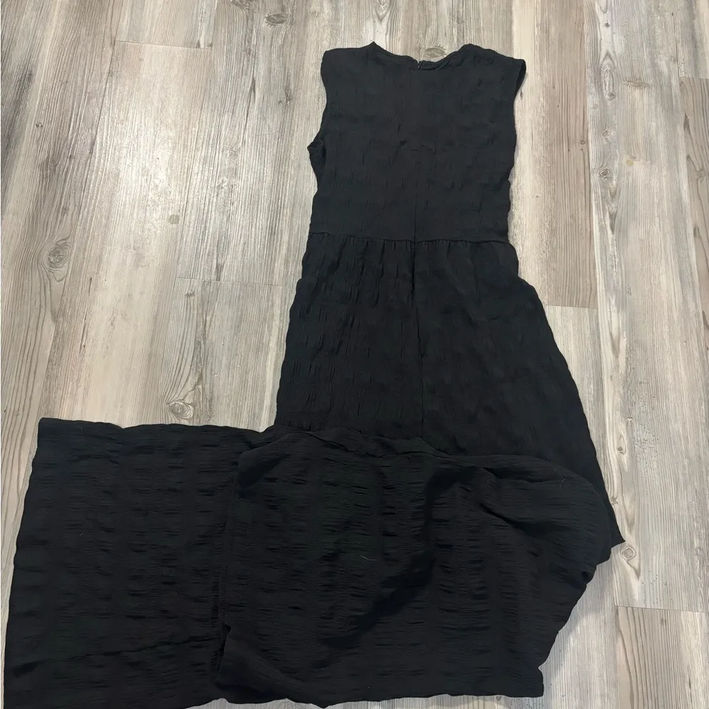 Black lightweight jumpsuit size small chest is 15 inseam is 27 - Image 2