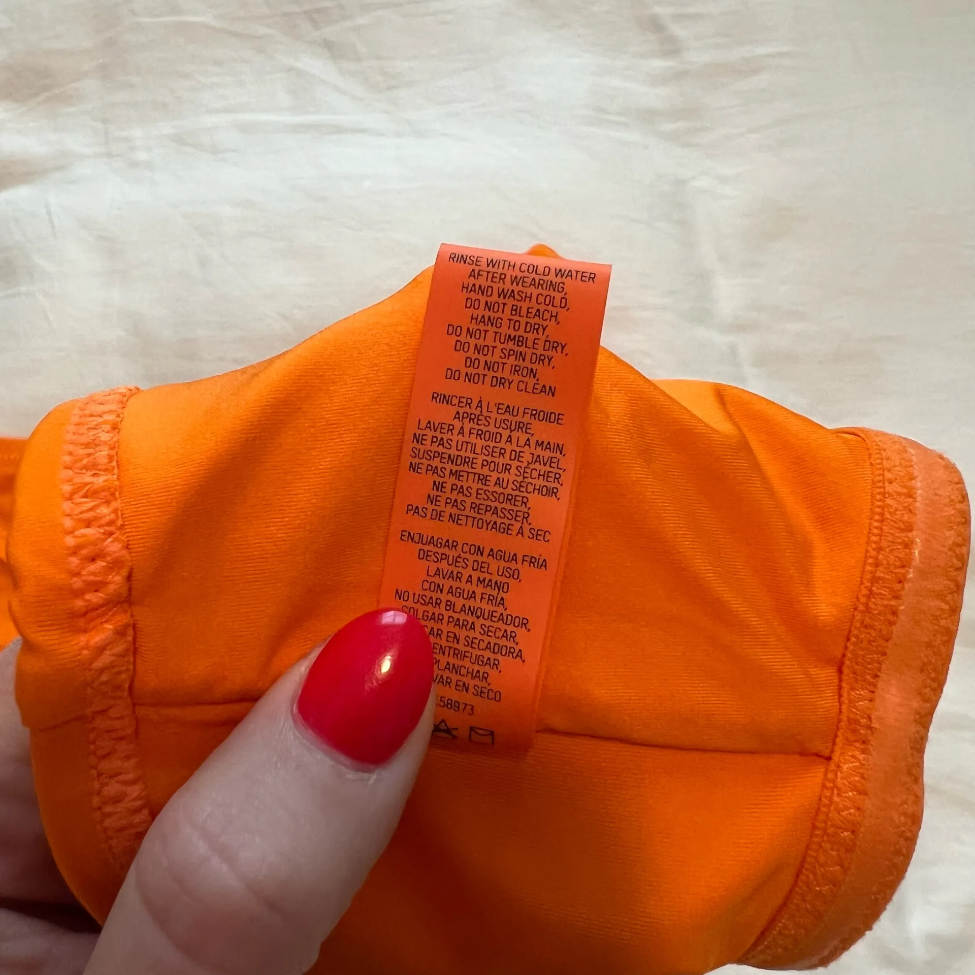 SKIMS Swim Bandeau Bikini Top and Mid Coverage Bottoms in Bright Orange Bikini Set - Image 6