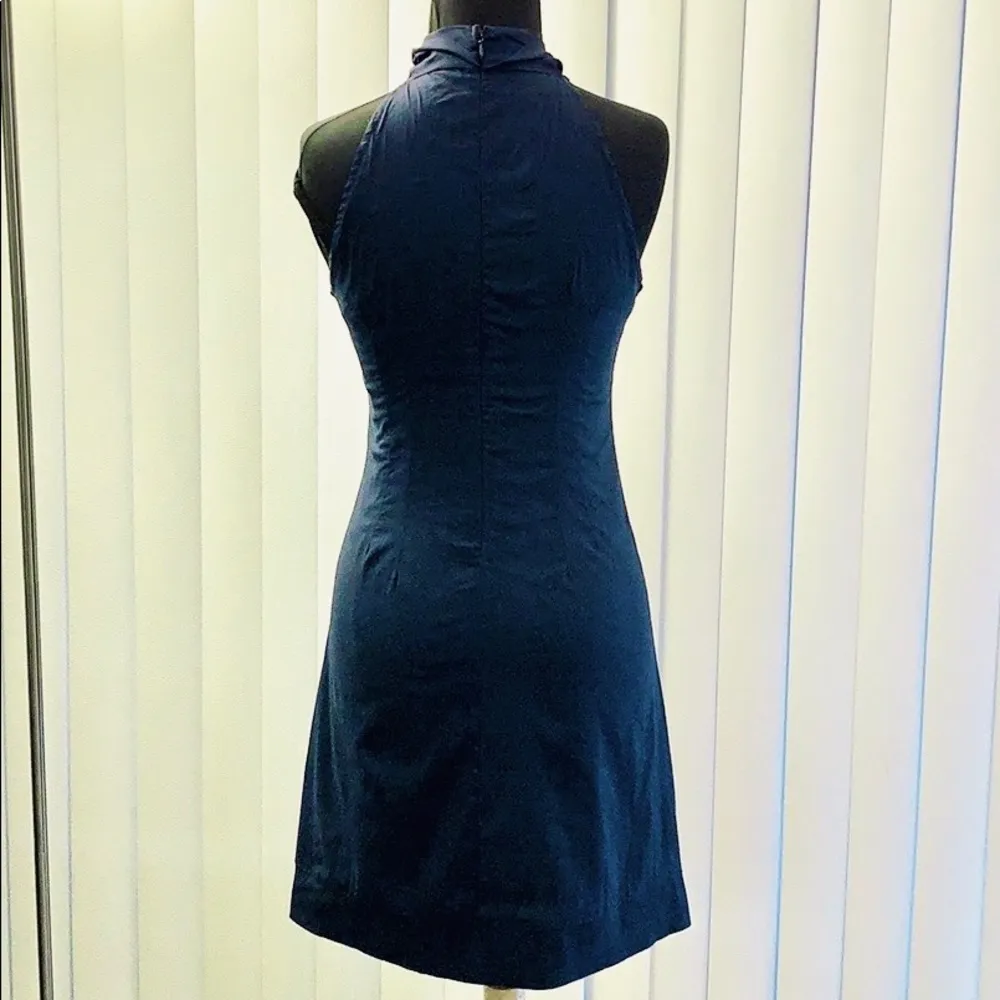 Navy blue sleeveless ruffled collar mini dress. - Image 4