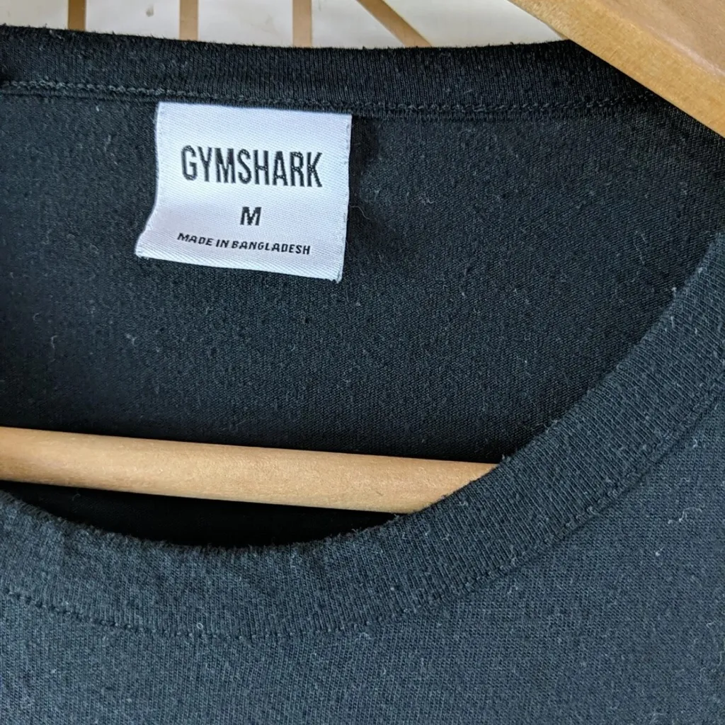 Gymshark Women's Black Short Sleeve Asymmetrical Slit Top Size Medium - Image 4