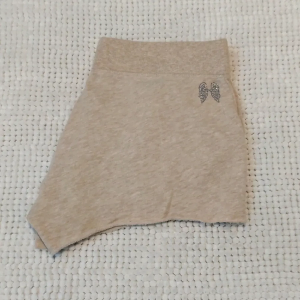Supermodel Essentials Tan Angel Wings Shorts Size Medium EUC #4704 - Image 4