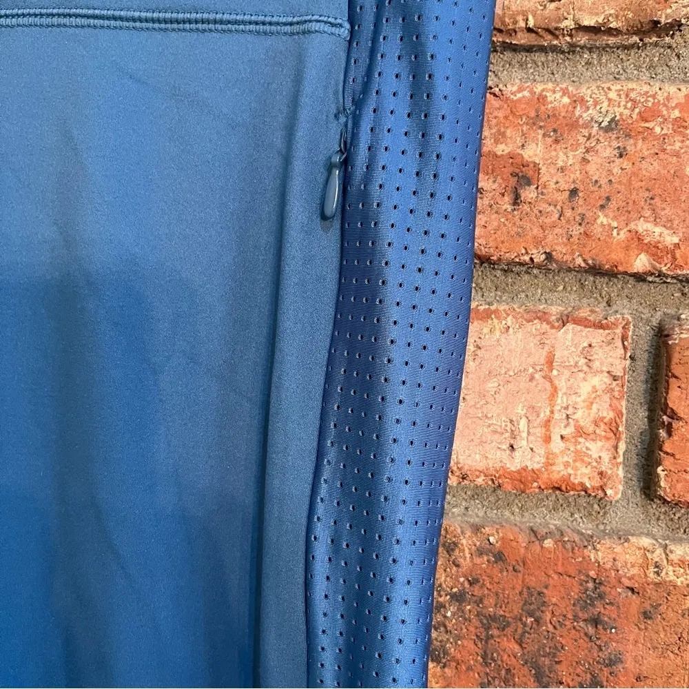 Fabletics womens Motion 365 zip pockets high rise leggings teal medium - Image 3