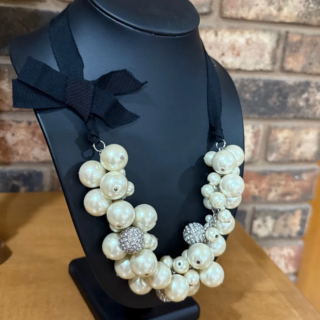 Faux Pearl and rhinestone statement necklace bow detail Black - Image 3