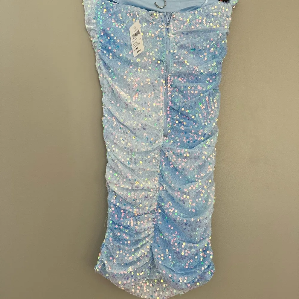 Enchanting Muse Iridescent Sequin Mini Dress
Light blue size medium New - Image 6