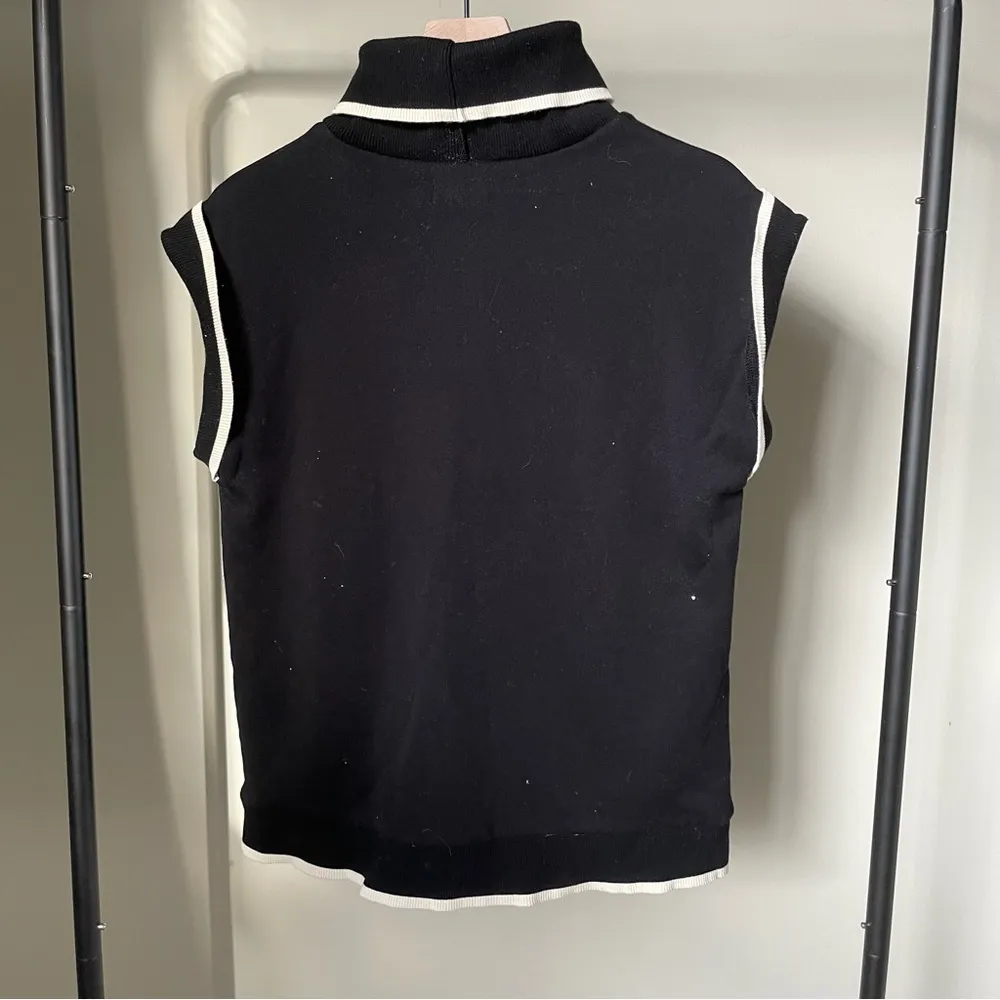 WKND Nation Fleece Turtleneck Tank in Black with Cream Lining - Image 2