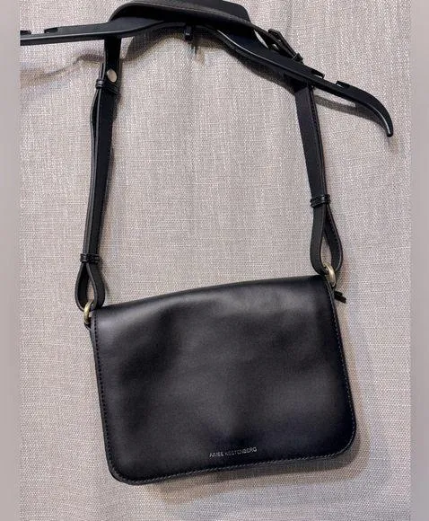 Aimee Kestenberg black leather purse with leopard print trim and stud details - Image 1