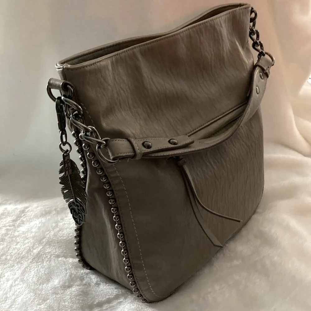 Jessica Simpson Bag with Studs and signature feather. - Image 12