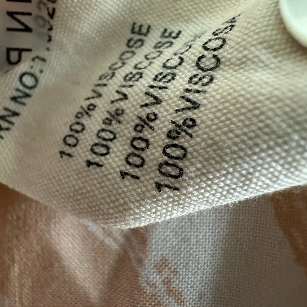 Frnch Paris Animal Print Cream and white blouse size medium/large - Image 4