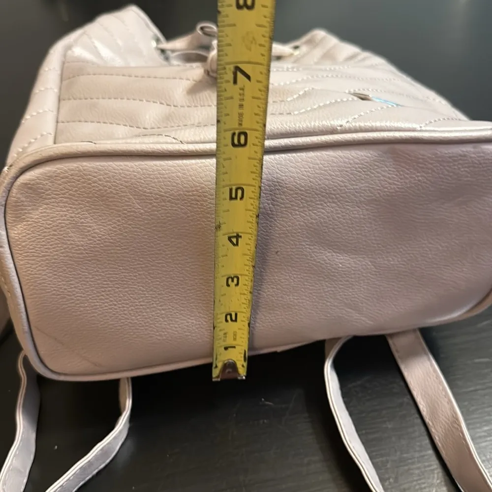 Convertible mini Backpack / shoulder faux leather bag by Bella Russo White - Image 4