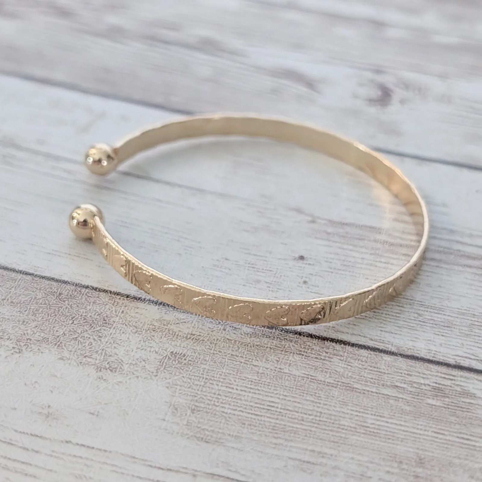 Gold Tone Bracelet with Heart Pattern - Image 4