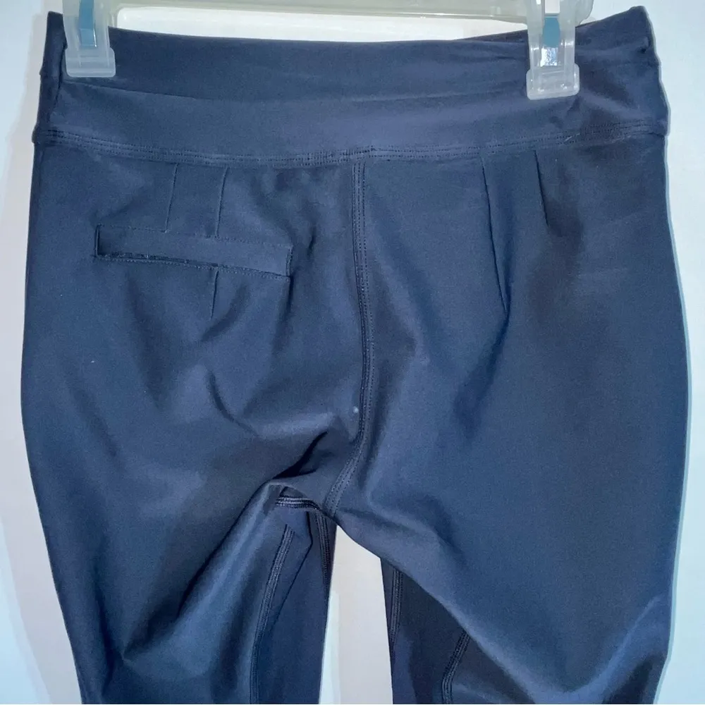 Lululemon athleta women’s size 4 pants with back calf zippers, zipper pockets. - Image 5