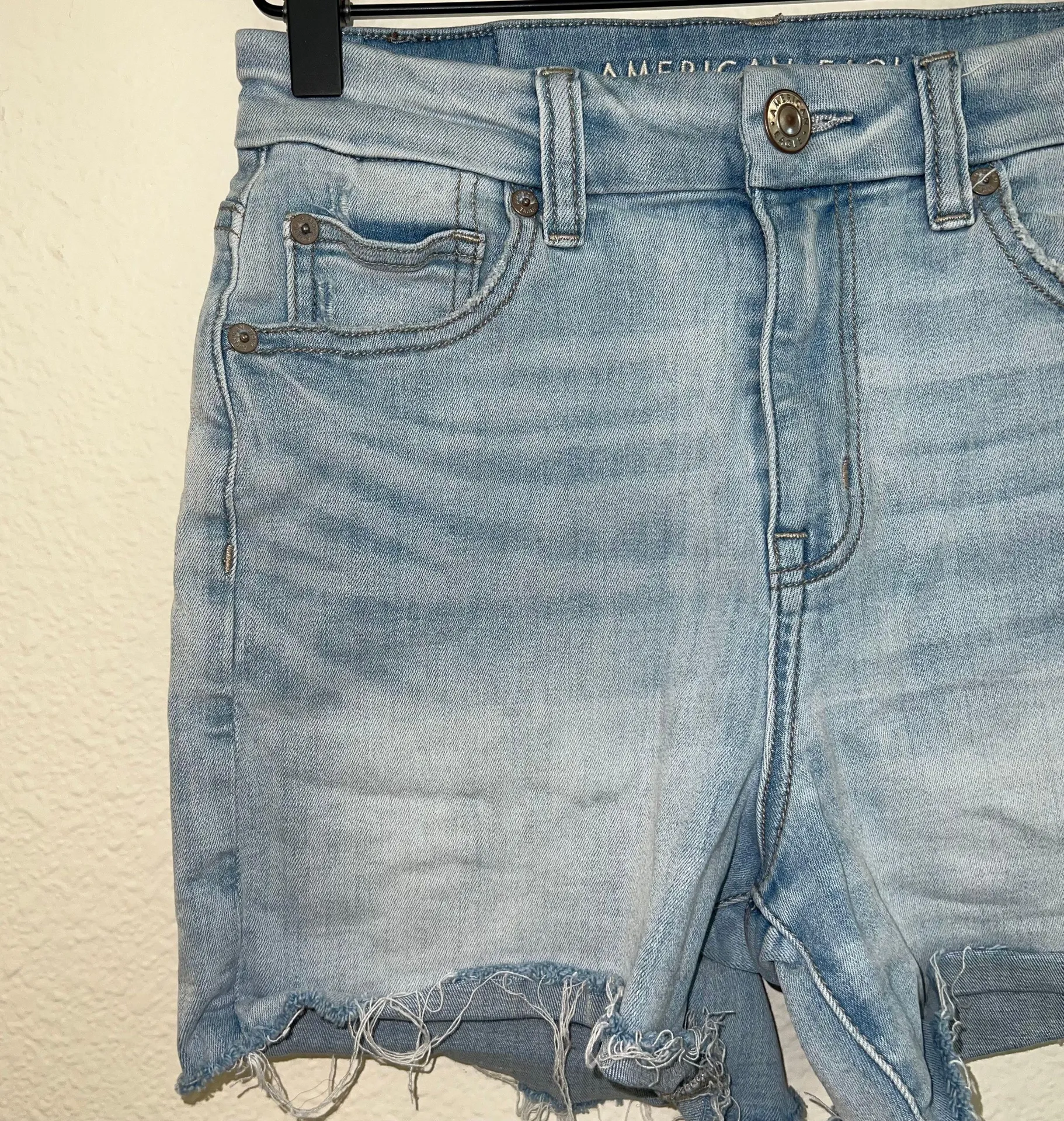 AE Distressed Next Level Stretch Curvy Hi Rise Shortie Shorts - Image 2