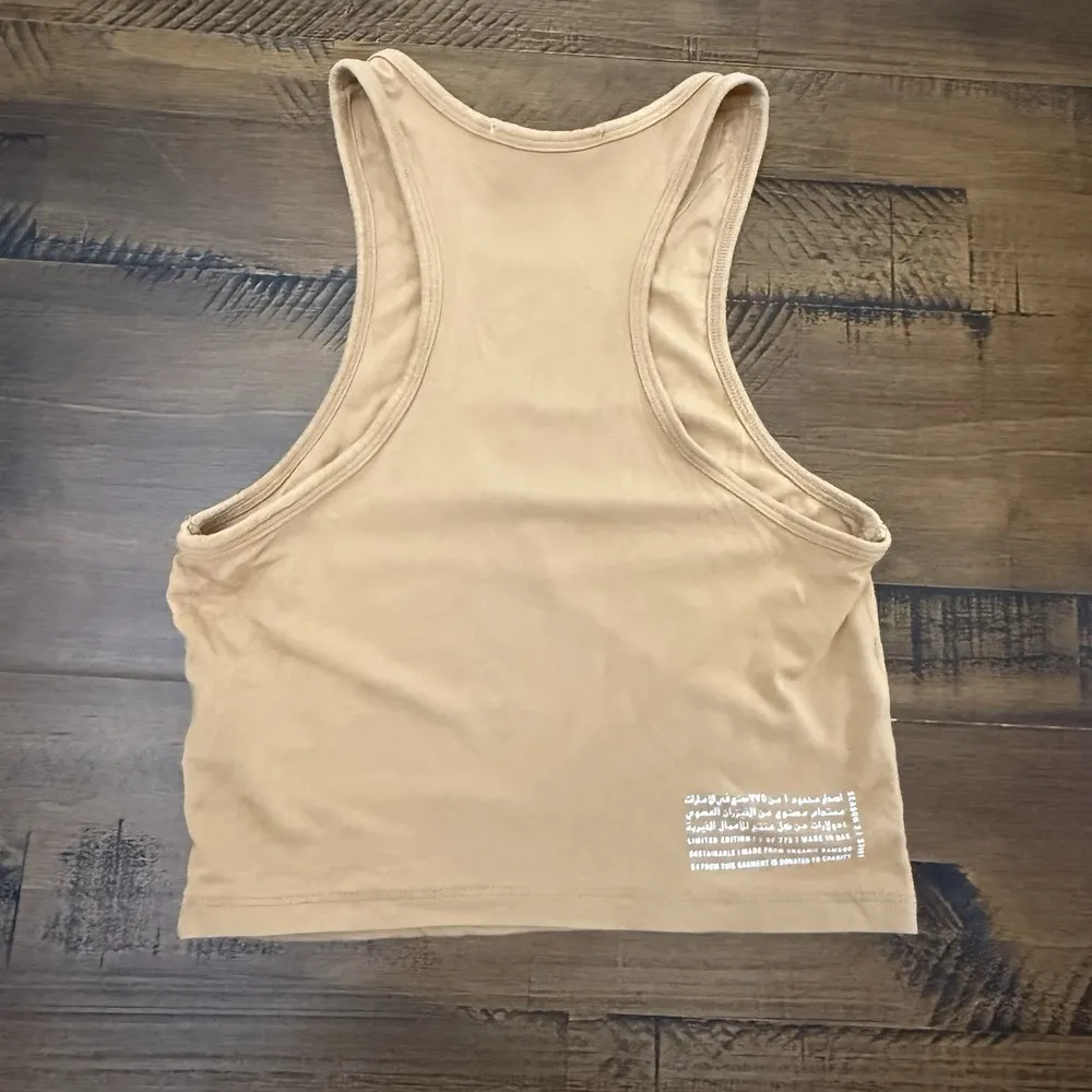 The Giving Movement Tan Tank Racerback Size Small Crop - Image 2