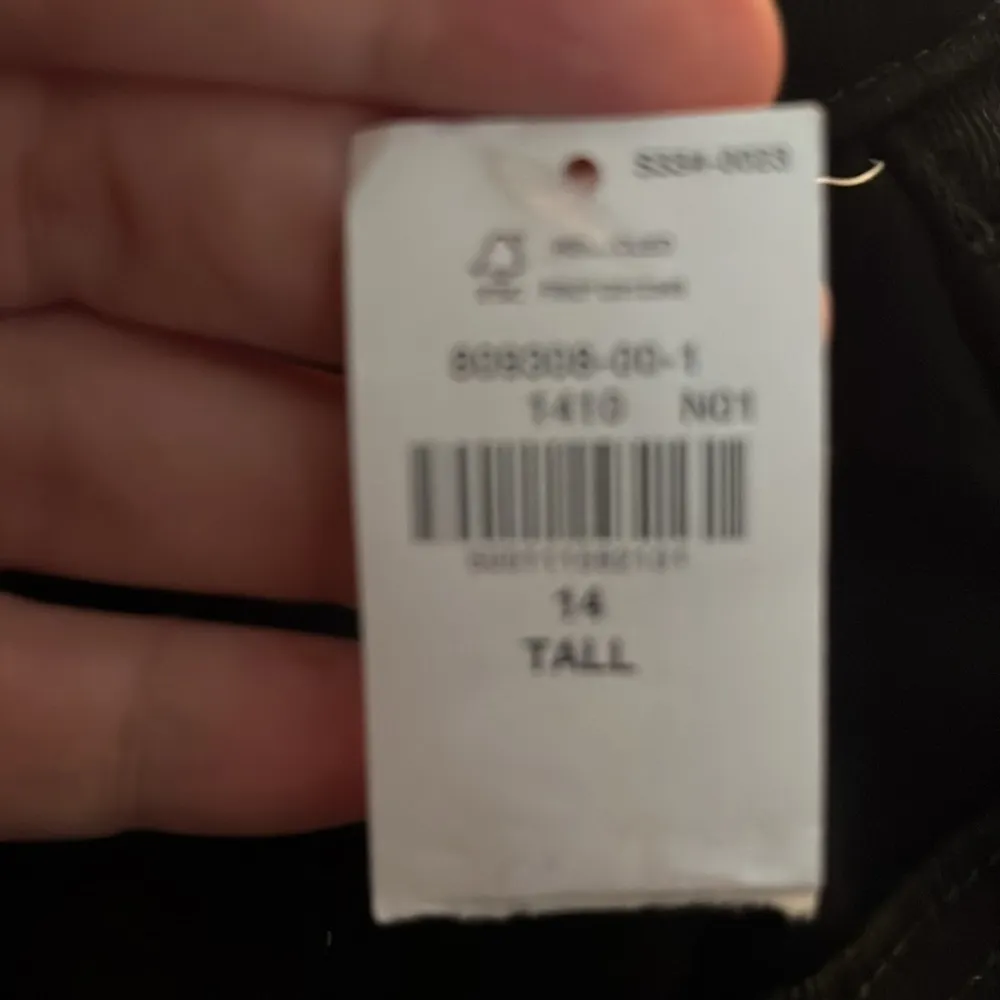 NWT women’s black high-rise OG straight built -in warm jeans size 14. - Image 9