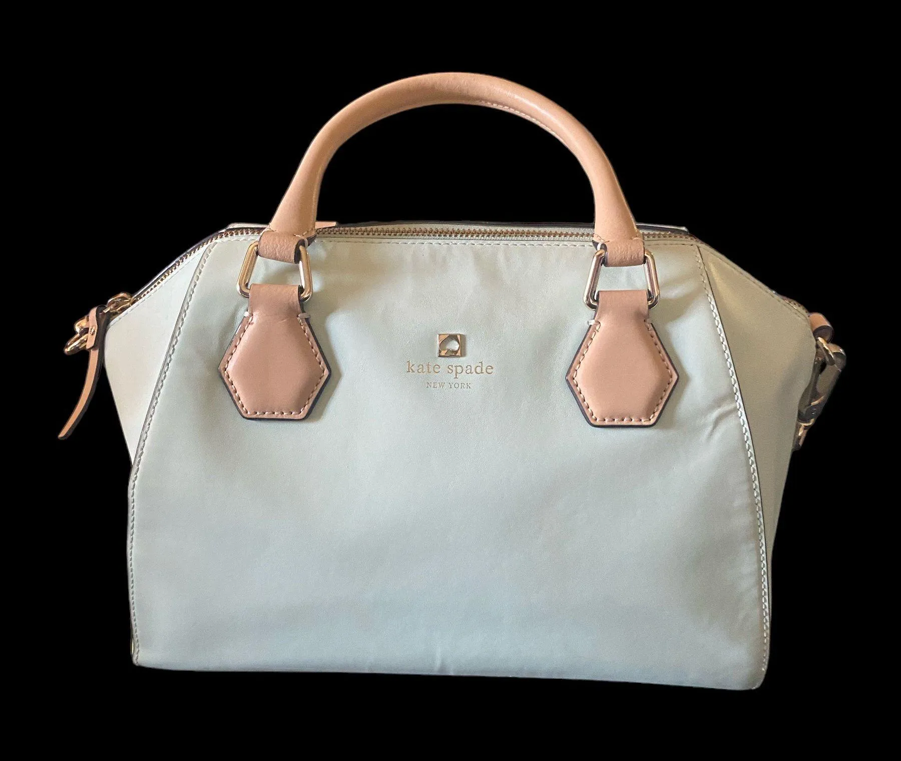 NEW YORK-MINT MOJITO PIPPA PARNELL STREET LEATHER SATCHEL Perfect spring bag, mint green white tan handle and crossbody strap, top zip closure, stripe print interior, inside zip pocket, inside two open pockets, amazing condition, there are two call outs, a small smudge on the bottom of the bag and a small smudge on one corner, please see the last two pictures  **This bag is preowned and is being sold as is** - Image 5