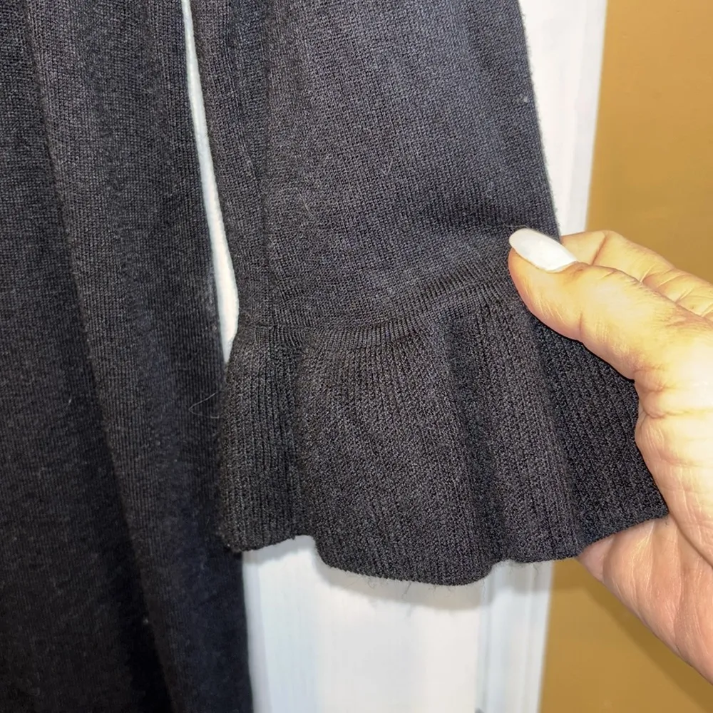 CONTEXT BRAND BLACK SWEATER DRESS
LONG SLEEVE WITH RUFFLE ON CUFF AND BOTTOM HEM - Image 4