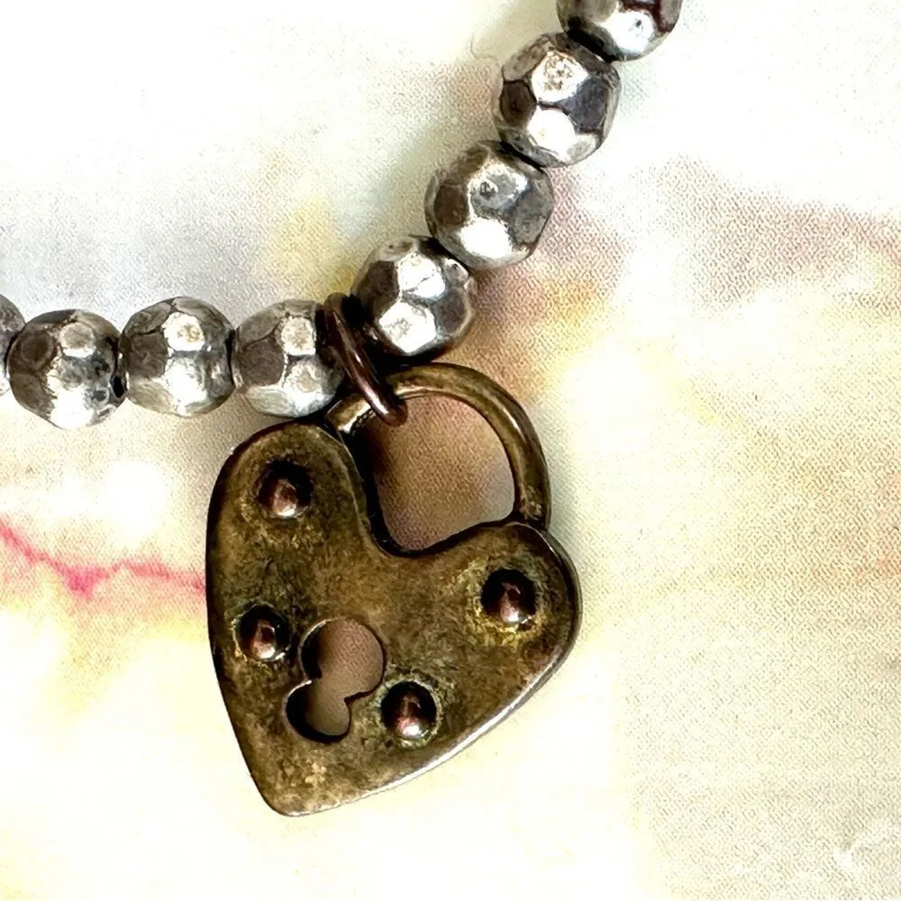 Silver/brass tone charm stretchy bracelet - Image 5