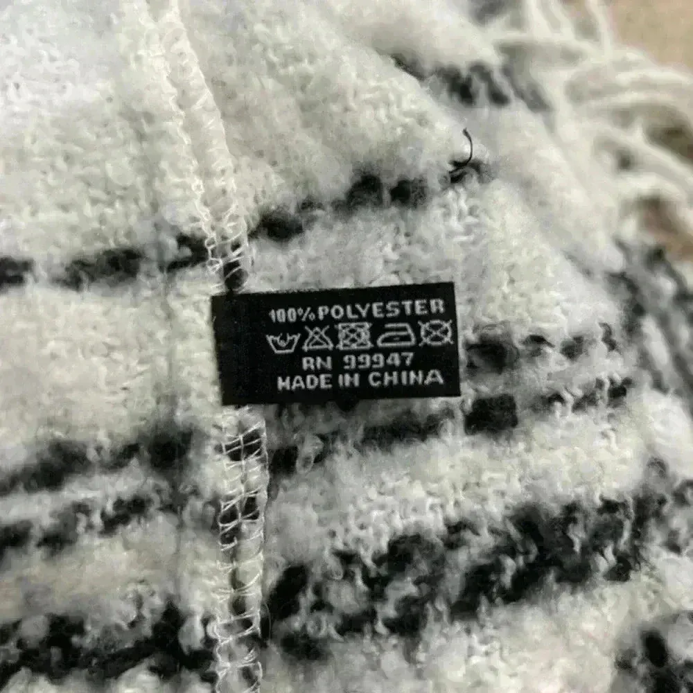 Black and white plaid fuzzy infinite scarf - Image 4