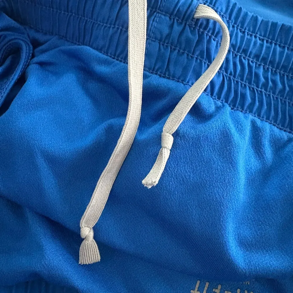 Women’s Nike DriFit Blue Lined Athletic Running Shorts M - Image 9