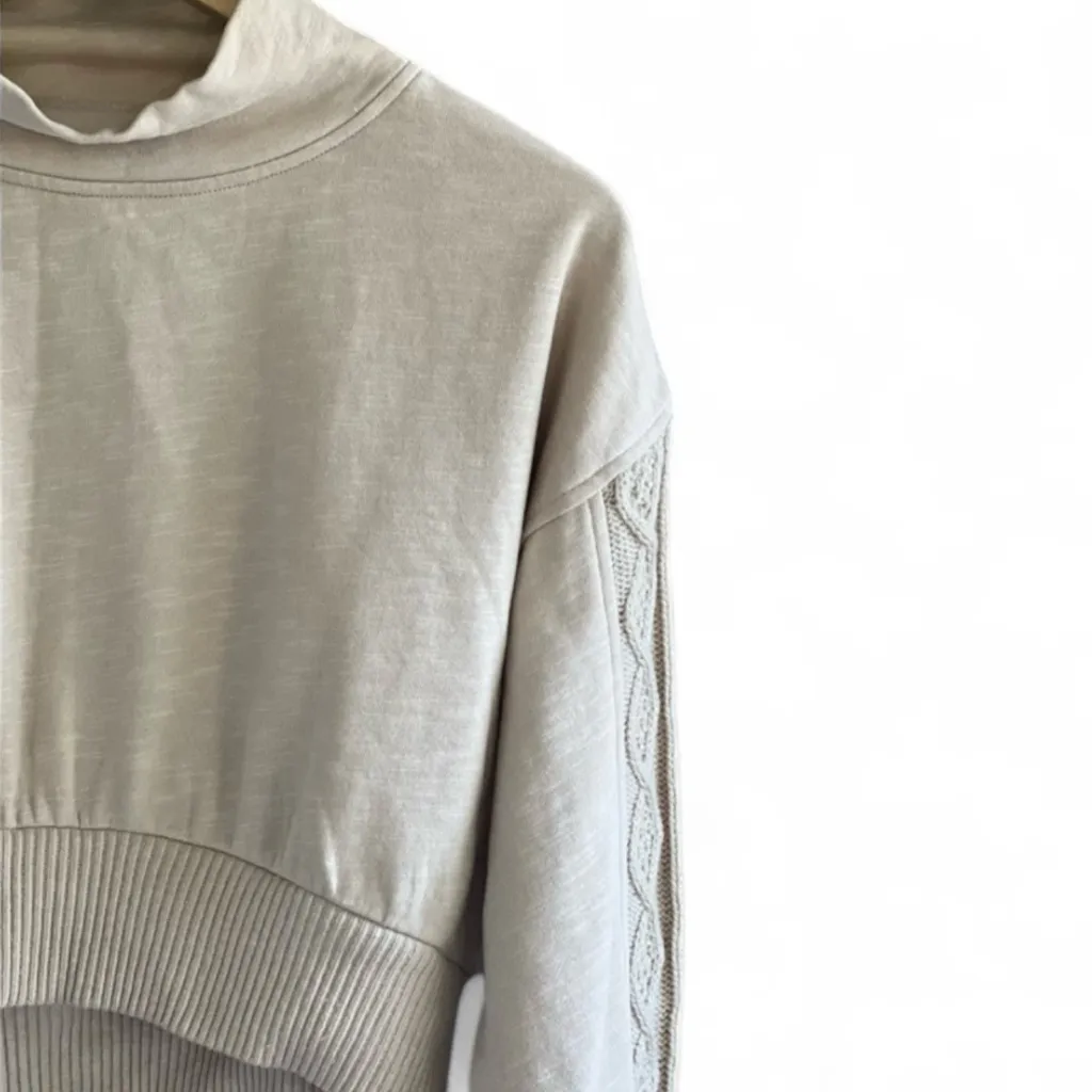 Urban Outfitters  cropped sweatshirt with cable-knit detailing on the sleeves. - Image 2