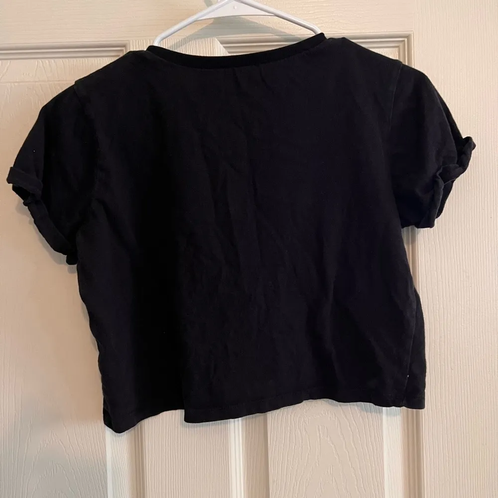 Women’s Jurassic Park “Don’t worry I don’t bite” dinosaur black cropped tshirt s - Image 2