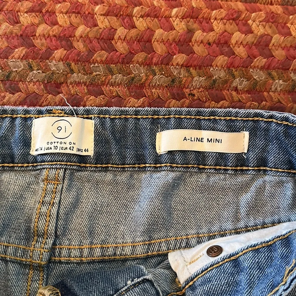 COTTON ON DISTRESSED DENIM CUT OFF A LINE MINI SKIRT - Image 2