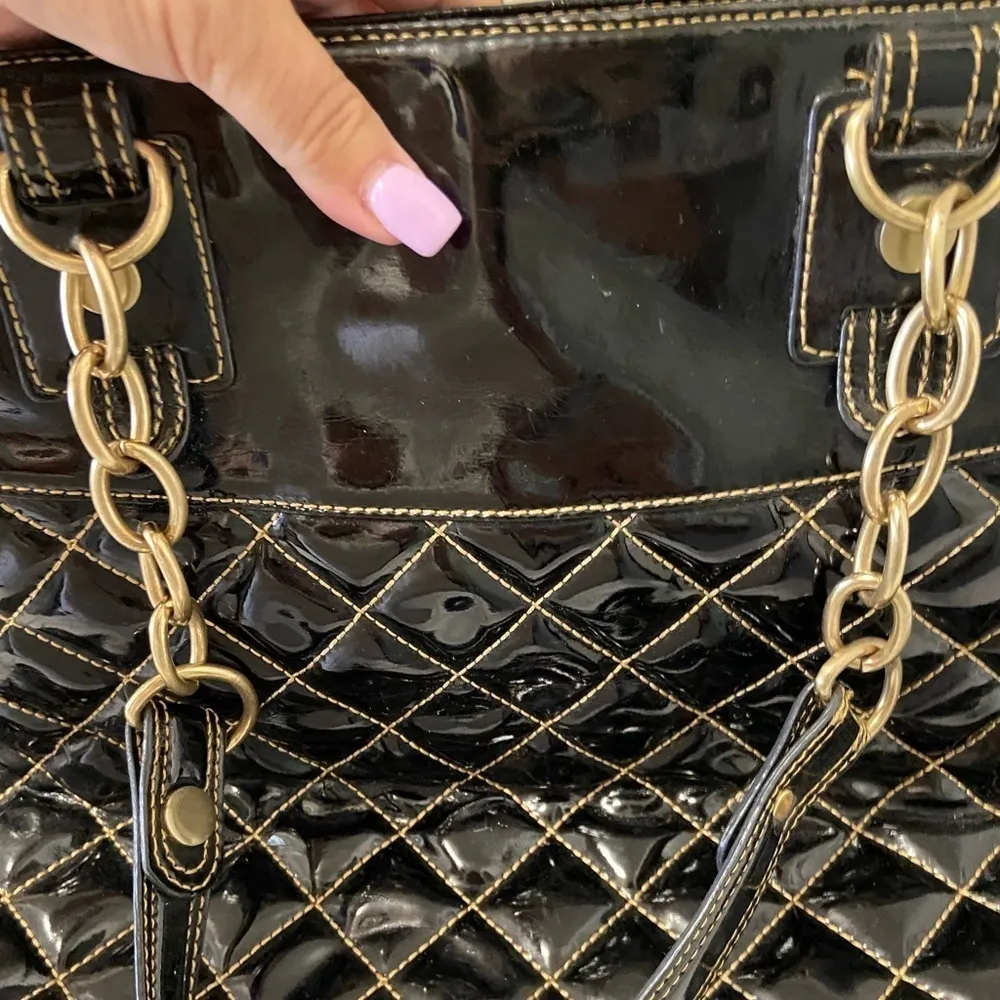 Maxx New York black patent quilted purse w gold chains on handles cheetah lining - Image 2