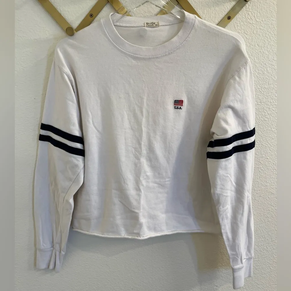 Brandy Melville John Galt Embroidered Flag Varsity Cropped Long Sleeve Top White - Image 3
