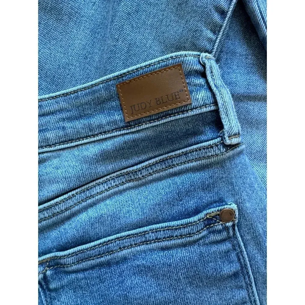 Trendy Distressed Medium Wash Straight Leg Jeans with Ripped Details - Image 7