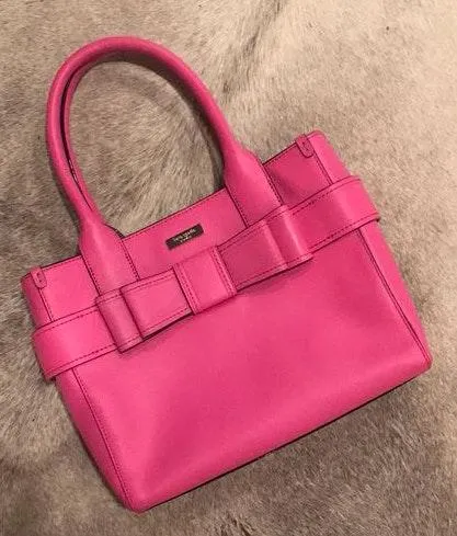 Kate spade purse with a bow hotsell