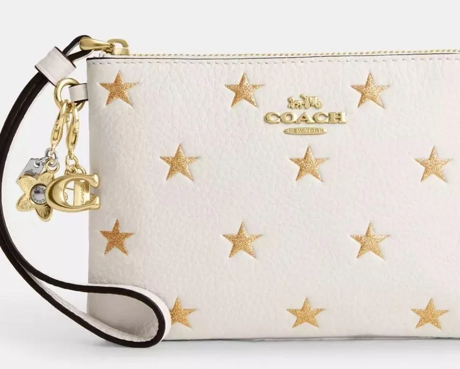 Authentic COACH Leather glitter stars wristlet and 2 charms set in box ๐