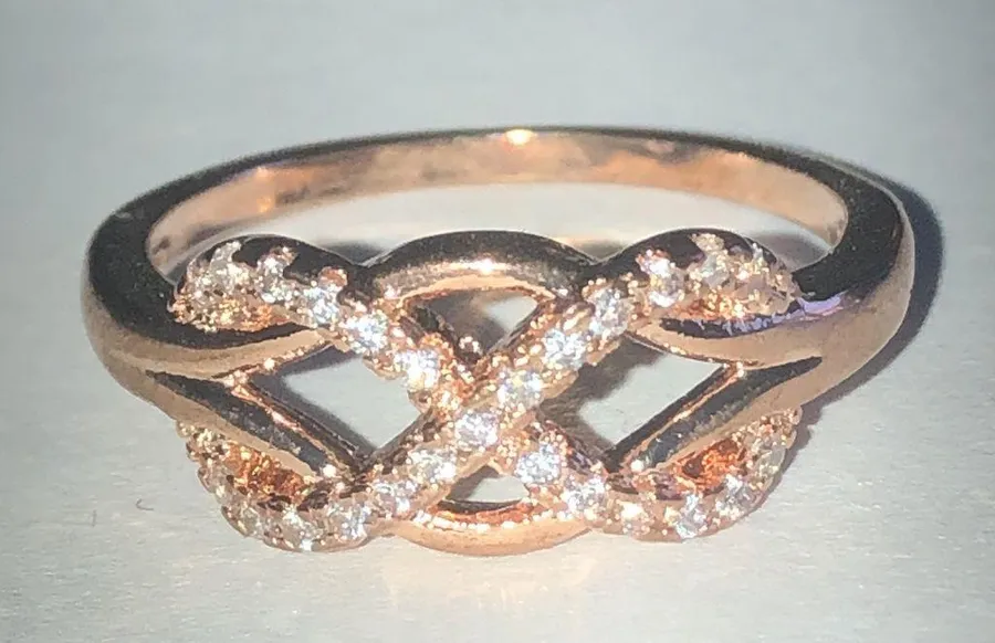 Rose Gold Tone Infinity Ring with Crystals